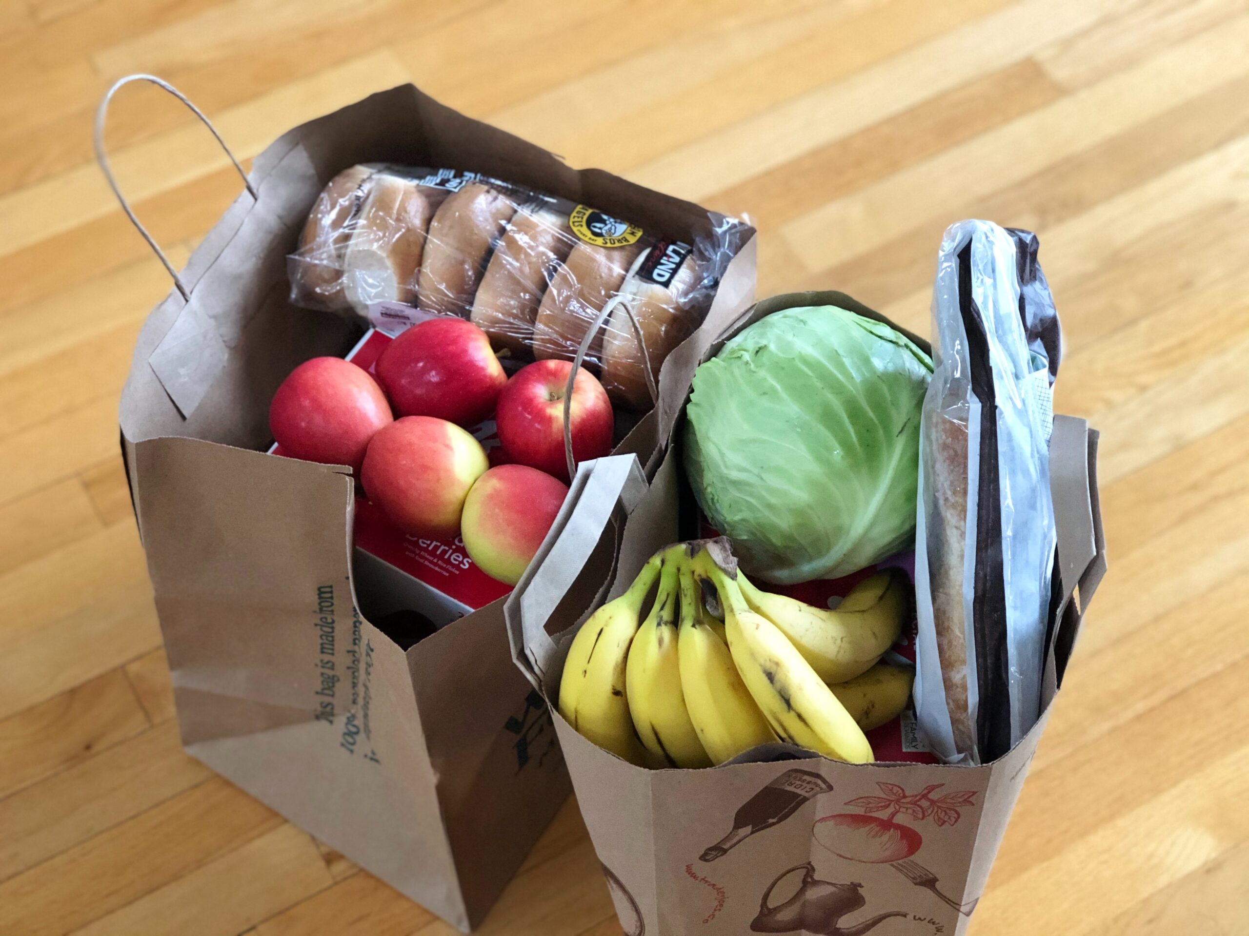 fruits and vegetables on paper shopping bag